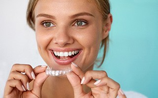 patient using teeth whitening at home