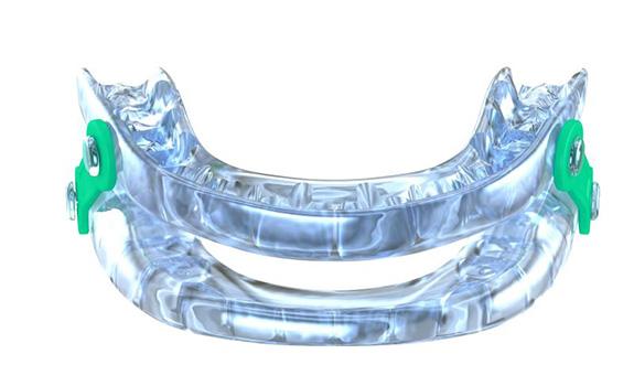 Oral appliance for sleep apnea against white background