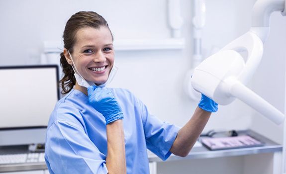 Dental hygienist smiles