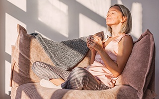 Invisalign patient in Dallas relaxing